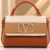 Elegant_Tri-Tone_Handbag_Studio_Portrait_cleaned